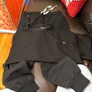 Men’s figs scrubs size medium.